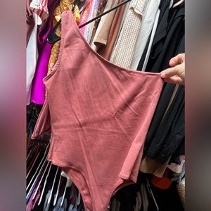 Pink and tan bodysuits